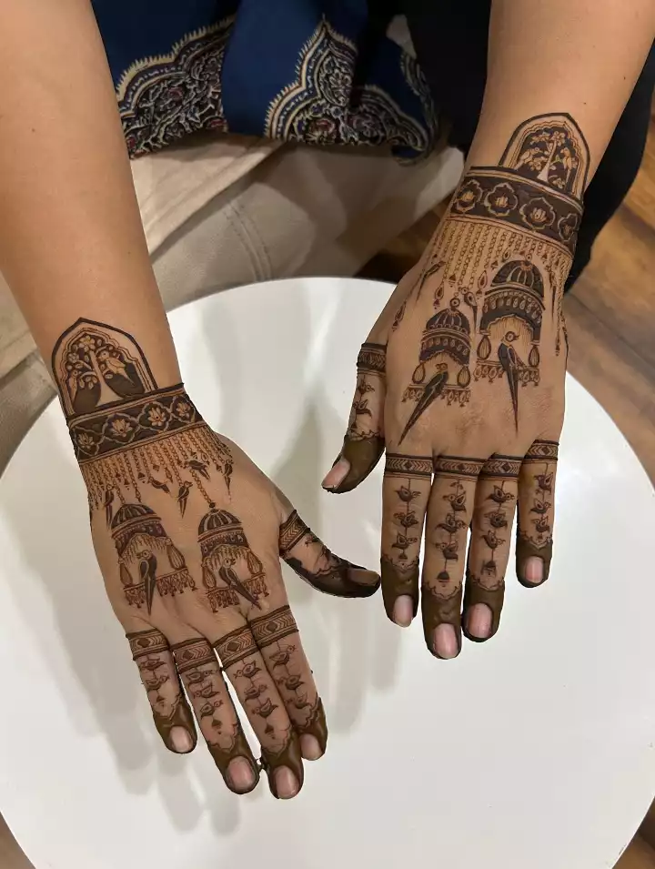 Back Hand mehndi design to try for bride