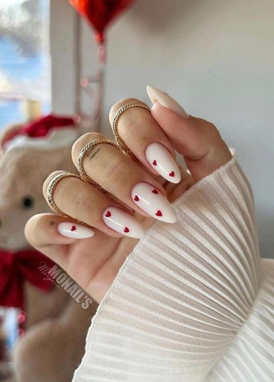 Try this nail art on white nail paint for your next Nail studio visit